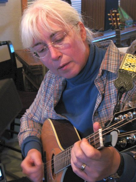Kathy playing the octave mando